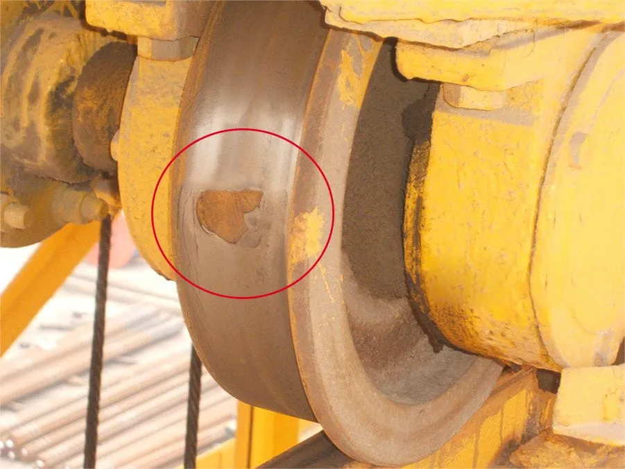 3. The running part of the big car metal fatigue spalling on the tread surface of the wheels.jpeg
